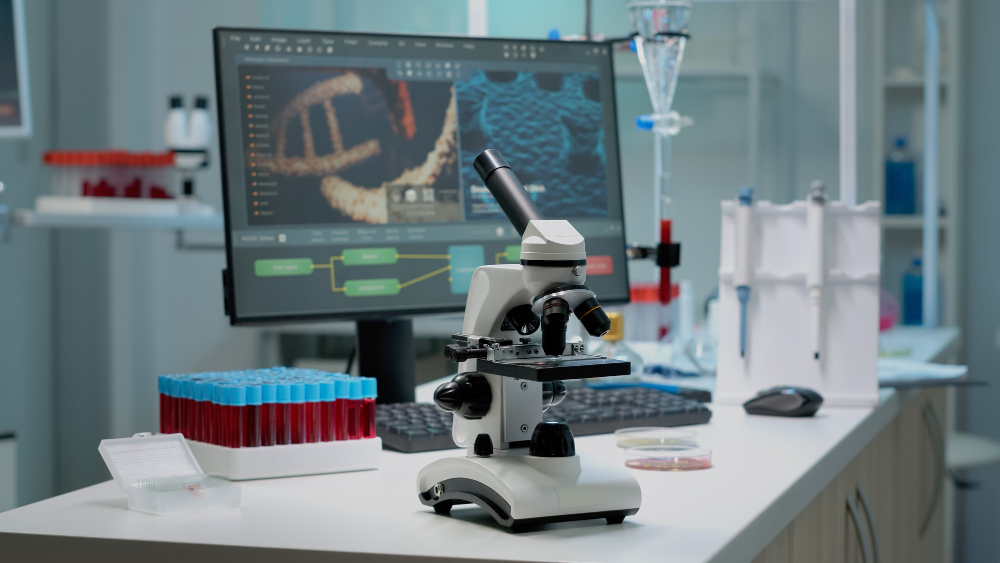 Scientific microscope on laboratory desk